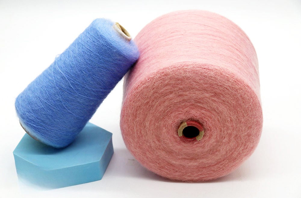 Using Angora goat hair as the main material, along with wool and nylon, this yarn has a great feel and stretch.