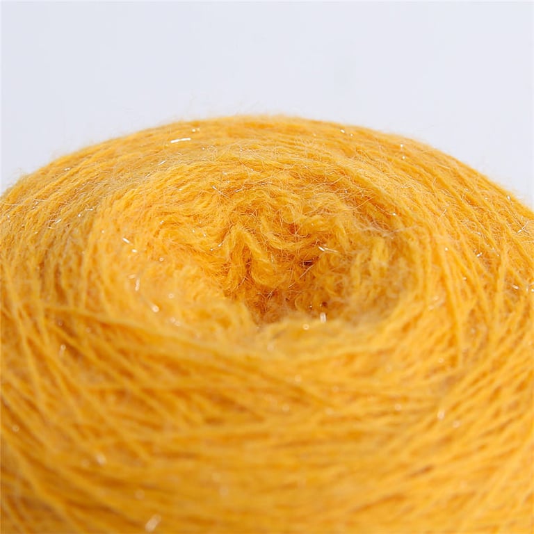 Yarns with silver bright filaments
